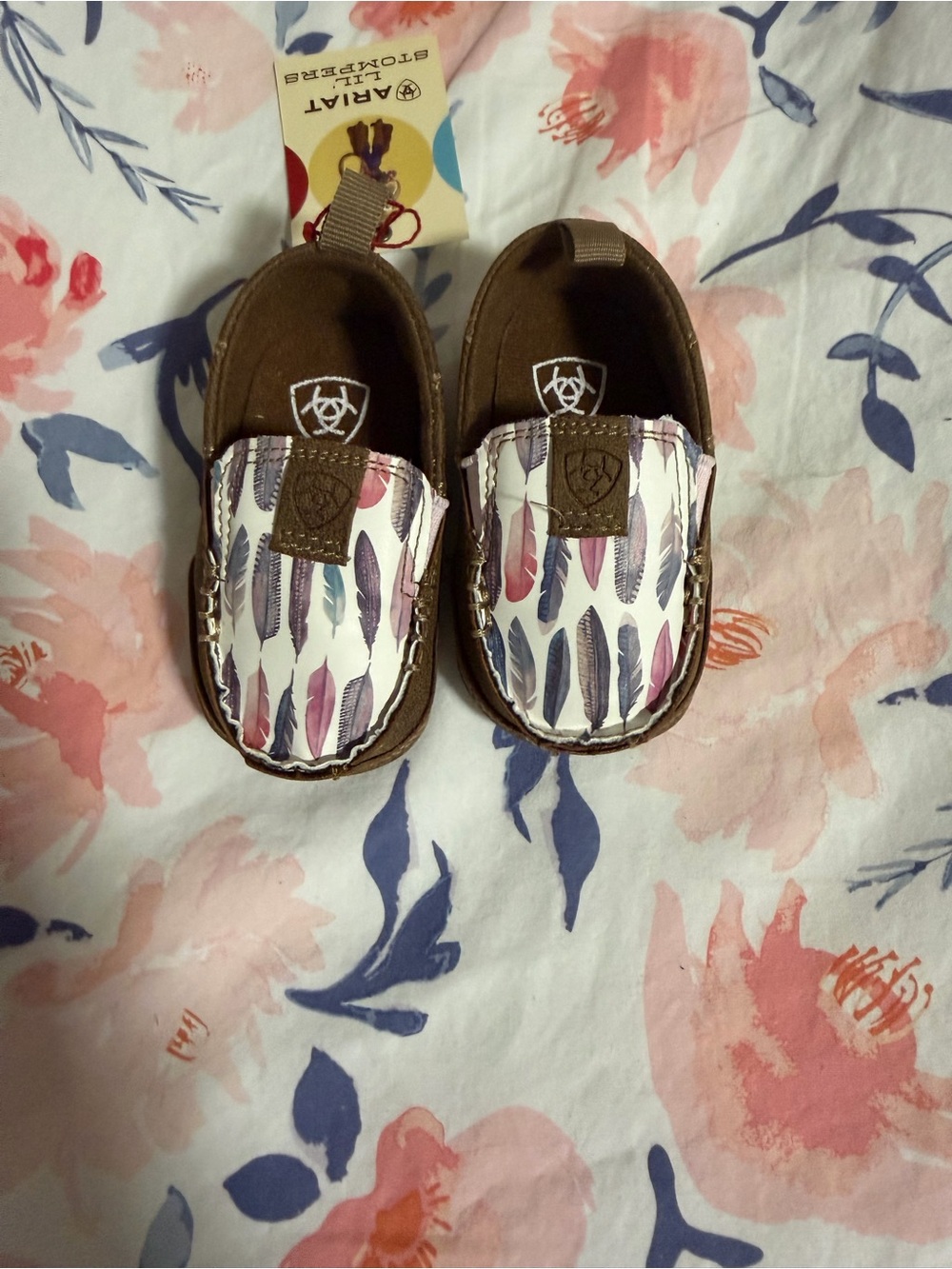 Ariat Baby Slip-On Moccasins with Purple, Pink and Blue Feather Print